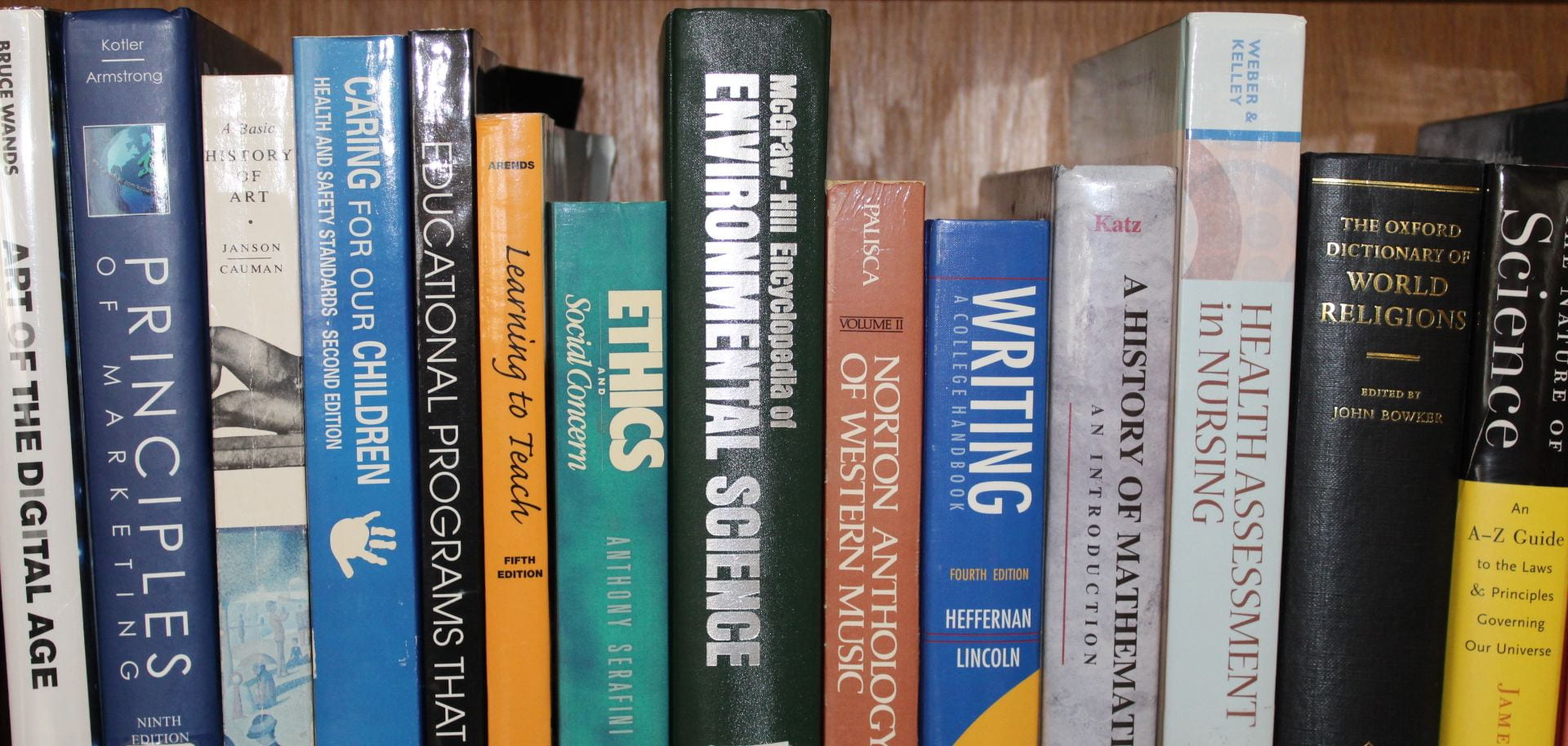 Shelf of books of different subjects.